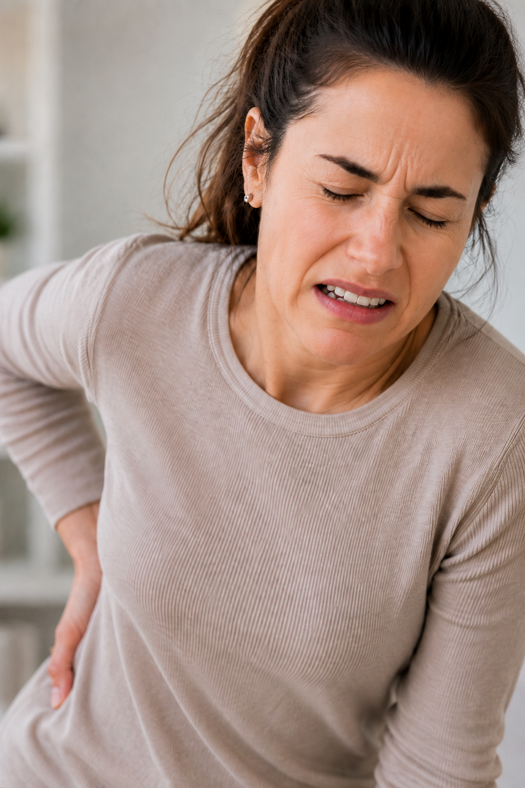https://mid-county.health/wp-content/uploads/2026/06/woman-back-pain.png